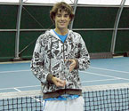 Andrew McLeod is presented with the Gallipoli Youth Cup after beating top seed Barrett Franks in the boys' singles final