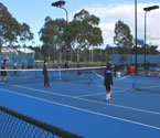 Students participating in a range of tennis activities